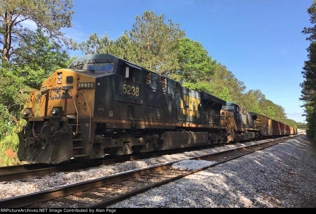 CSX 5238 and 210 wait for green